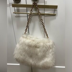 Gorg Fur H&M bag. Beige faux fur with gold chain.